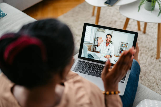 istock Young Woman Having A Doctor's Appointment Online At Home 1648175251