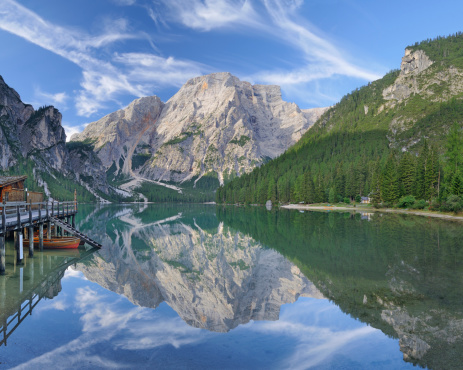 Summer view of the spectacular Braies Lake. In the background the vertical face of the Croda Del Beco  (Dolomites - Italy)