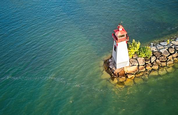 istock Aerial View of a Lighthouse at a Marina 1648186653