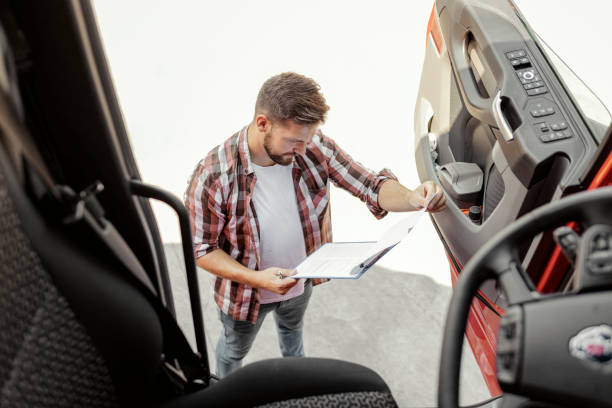 istock Truck Dispatcher Checking Shipment List 1648190113