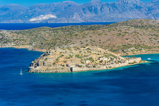 The ruined Venetian fortress and former leper colony of Spinalonga near Elounda on the Greek island of Crete