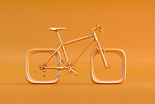 Bike with square wheels isolated on orange background.