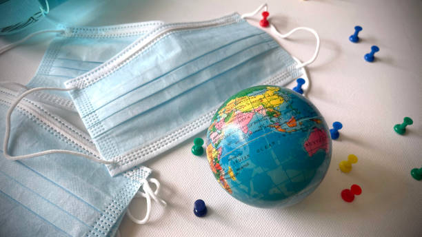 istock Earth Ball With Face Mask, Global, 1648220170