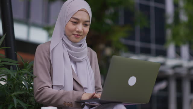 Muslim woman Creative new idea in computer laptop