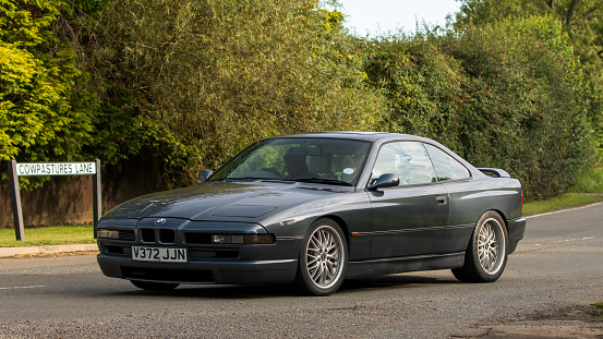 Whittlebury,Northants,UK -Aug 27th 2023: 1999 grey BMW 840 car travelling on an English country road