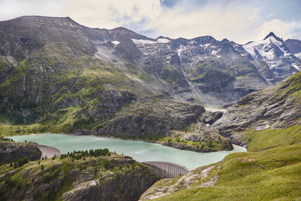 istock Grossglockner. Serpentine alpine road viewpoint. Speicher Margaritzen lake. Austria 1648249526