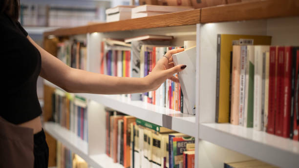 istock College student girl strolling through bookstore 1648303239