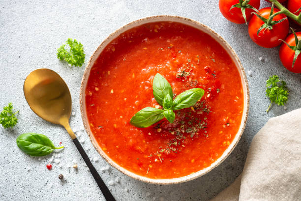 istock Tomato soup, vegan dish on white. 1648317903