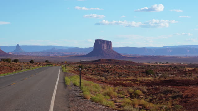 Monument Valley in Arizona. Road stretching to the horizon