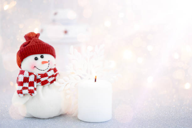 Christmas background with snowman, decorations and ornaments. Copy space.