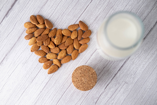 Organic alternative milk. Vegan milk from almonds nuts.