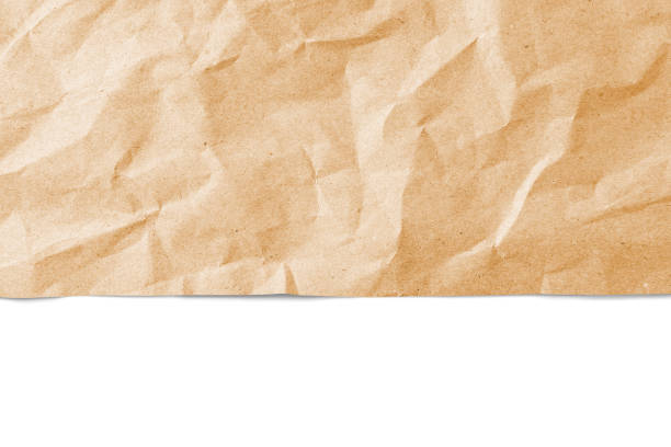 istock Recycled crumpled orange paper texture with edge, border isolated on white background 1648376249