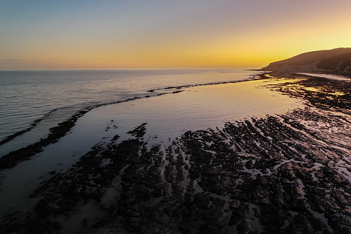 Low tide Eastbourne beach aerial view sunset sky Eastbourne East Sussex Southern England English Channel Europe