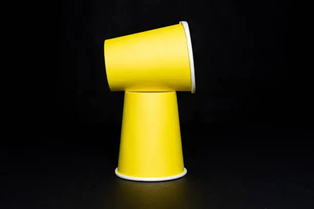 Yellow Paper cups, Papercups on black background