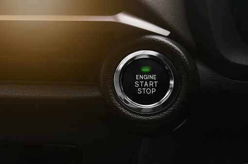 Push Start engine button on car
