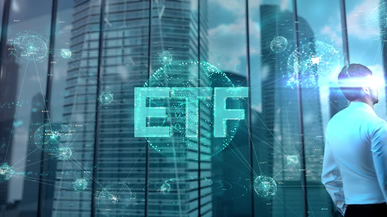 ETF. Businessman Working in Office among Skyscrapers. Hologram Concept