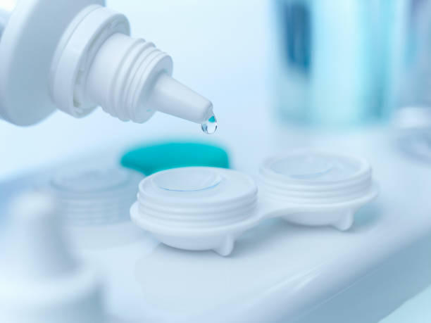 istock Close up of saline dropping on contact lens 164850739