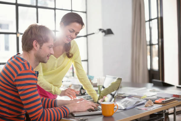 istock Couple working on laptop together 164851873