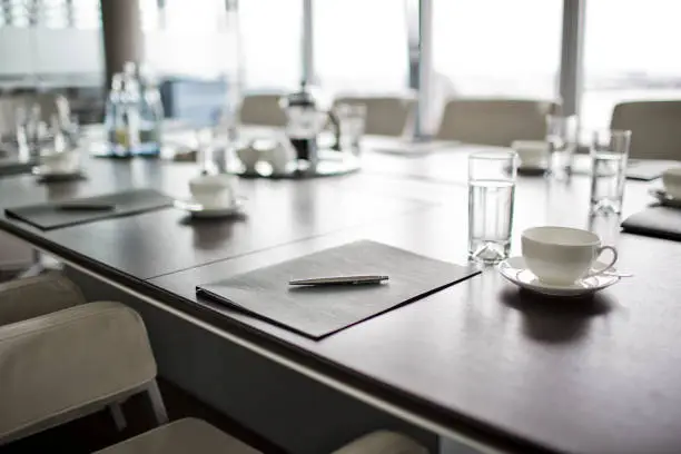 Photo of Table set for meeting in office