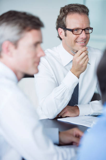 Multiracial business people having meeting and brainstorming discussed about work in conference room in the creative office.