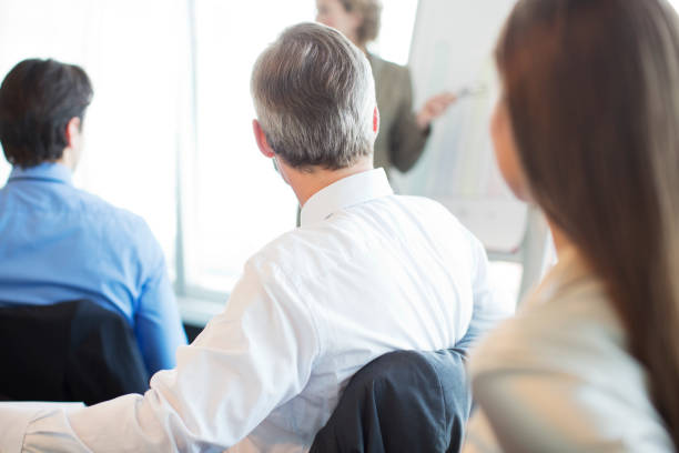 istock Business people sitting in meeting 164852252
