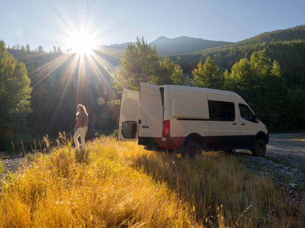 istock Mature woman walks away from camper van 1648523253