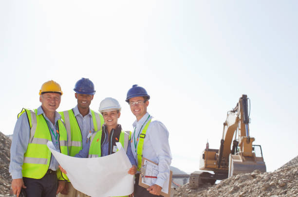 istock Business people reading blueprints in quarry 164852655