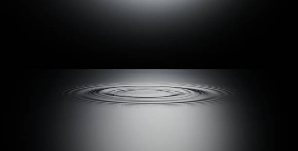 リップル、引き続き表面を水 - rippled ストックフォトと画像