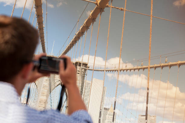 istock Man taking picture of urban bridge 164853221