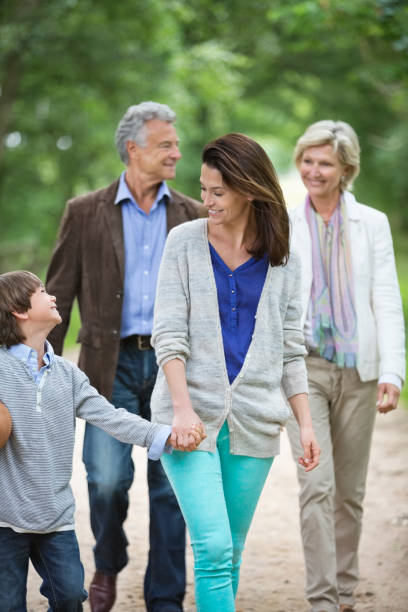 istock Family walking on rural road 164853479