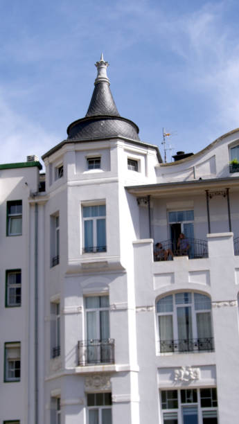 istock Facade of a building with a slate roof 1648536477