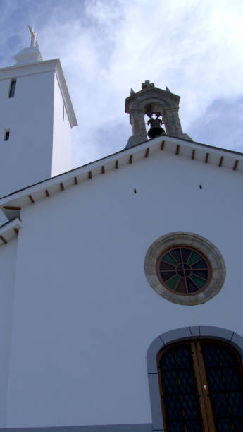 istock whitewashed church facade and tower in the background 1648542086