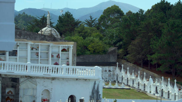istock cemetery at different heights and mountains in the background 1648542096