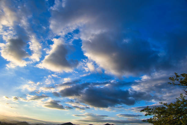 istock Clouds in the beautiful sunset sky dyed orange 1648552337