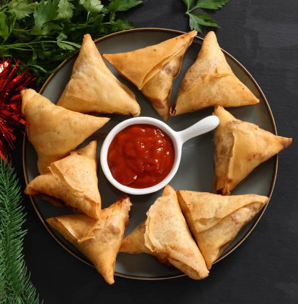 Curry meat Samosa with chili sauce