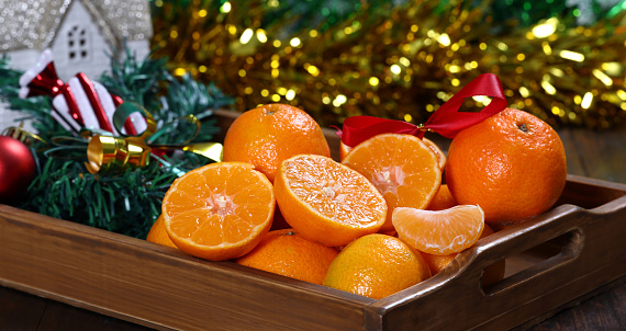 Oranges halved with Christmas decoration