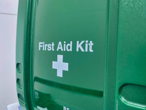 Green first aid kit box Photograph of a green first aid kit box priority baggage tag stock pictures, royalty-free photos & images