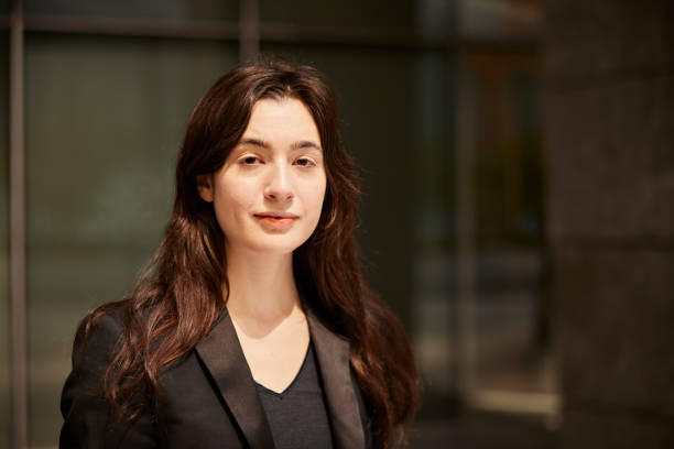 istock Street Professional: Businesswoman's Confident Headshot in Suit 1648595429