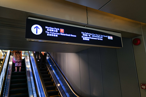 Singapore, Singapore, 08 august 2023: picture of the North East Line of the MRT Network in Singapore. The escalator leads to the Merlion.