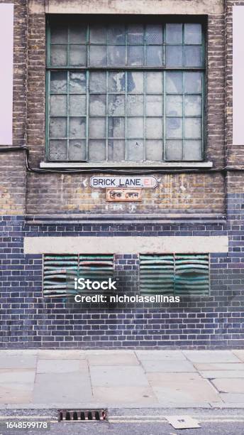 Brick Lane E1 Street Wall Sign London United Kingdom Life Top Destinations Grafitti Stock Photo - Download Image Now