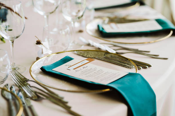 istock Table set up for a special event and a Menu list. 1648617651