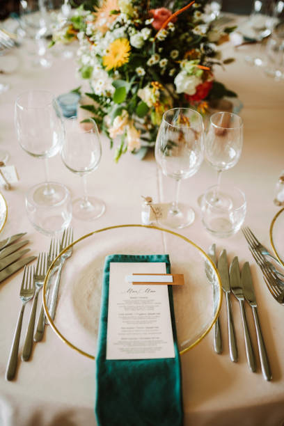 istock Table set up for a special event and a Menu list. 1648617659