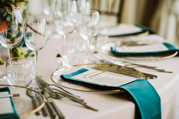 istock Table set up for a special event and a Menu list. 1648617663
