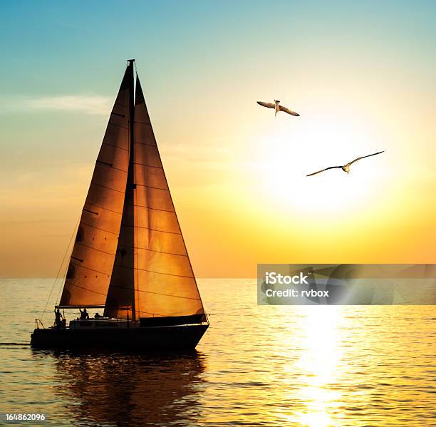 Sailing Ship Stock Photo - Download Image Now - Sailboat, Sunset, Sailing Ship