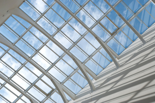 Sky and clouds seen through glass roof