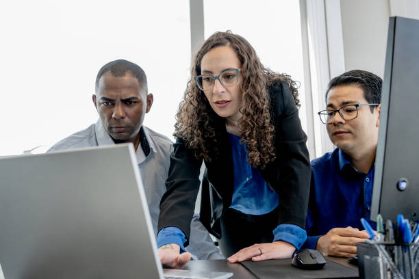 istock Cybersecurity team discussing in front of a monitor screen 1648641784