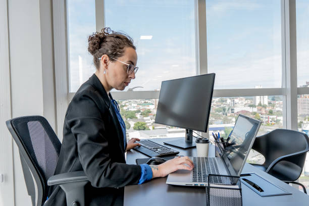 istock Woman working in company cyber security 1648642810