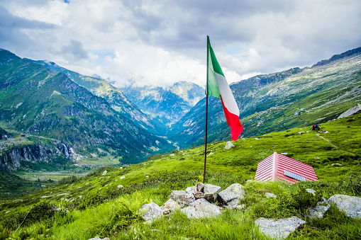 Mountain top with italian flag