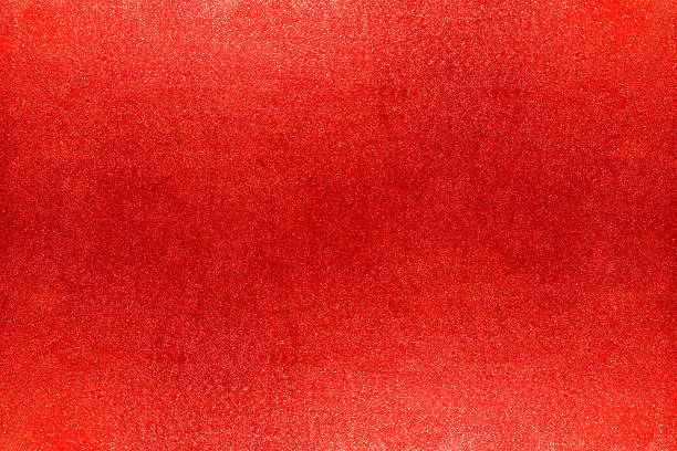 istock Red, golden, white, glitter Christmas texture background. Twinkling glow stars effect. Like outer space, night sky, universe. Rusty, rough surface, grain. 1648655369