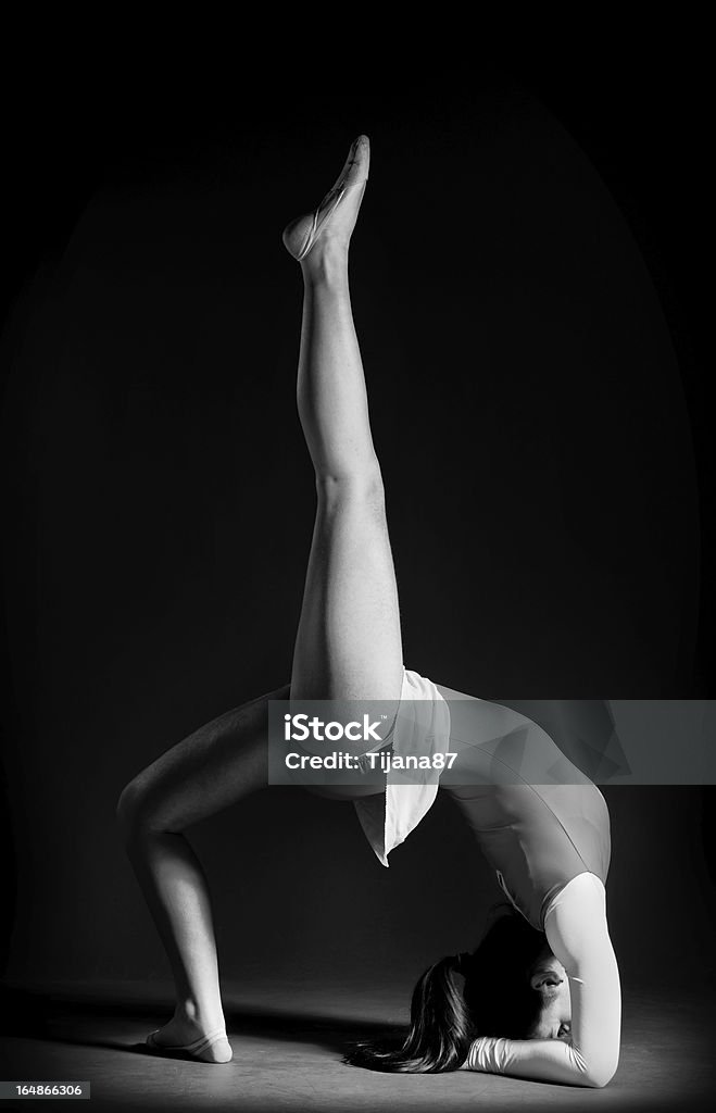 Gymnastics pose black and white Acrobat Stock Photo